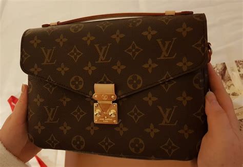 como saber si una bolsa de louis vuitton es original|louis vuitton bolsas pre owned.